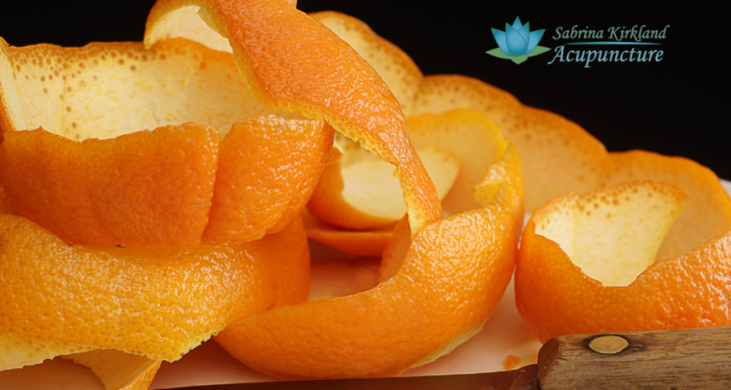 A close up of an orange sliced in half